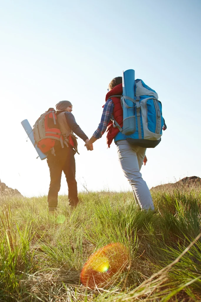 Couple Hiking On A Mountain
