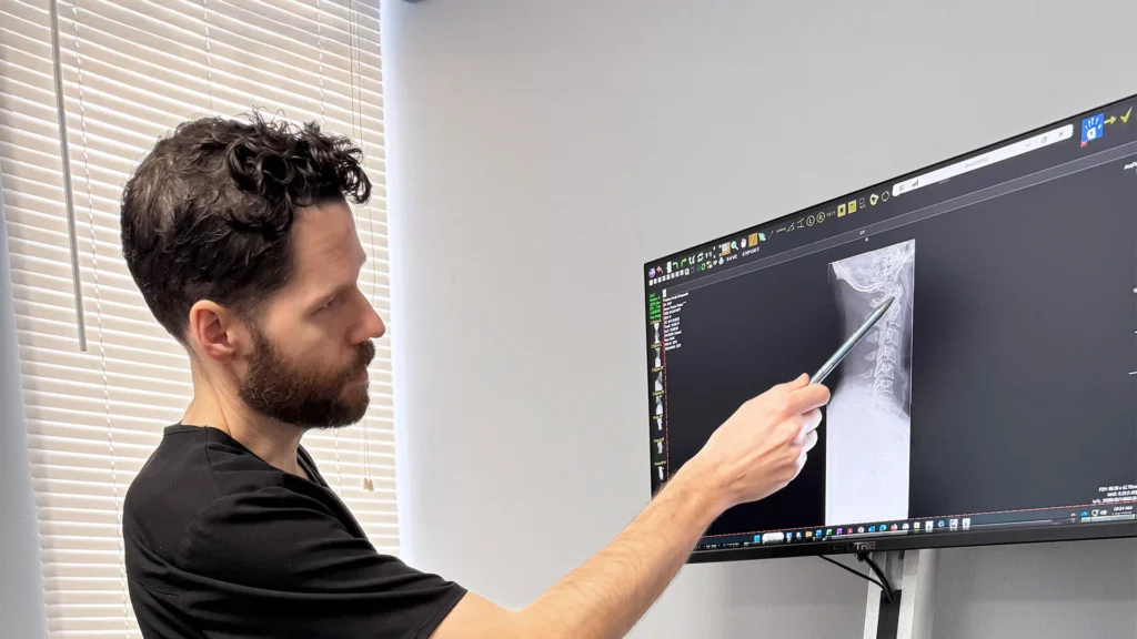 Dr Fish Points To an X-Ray On Screen